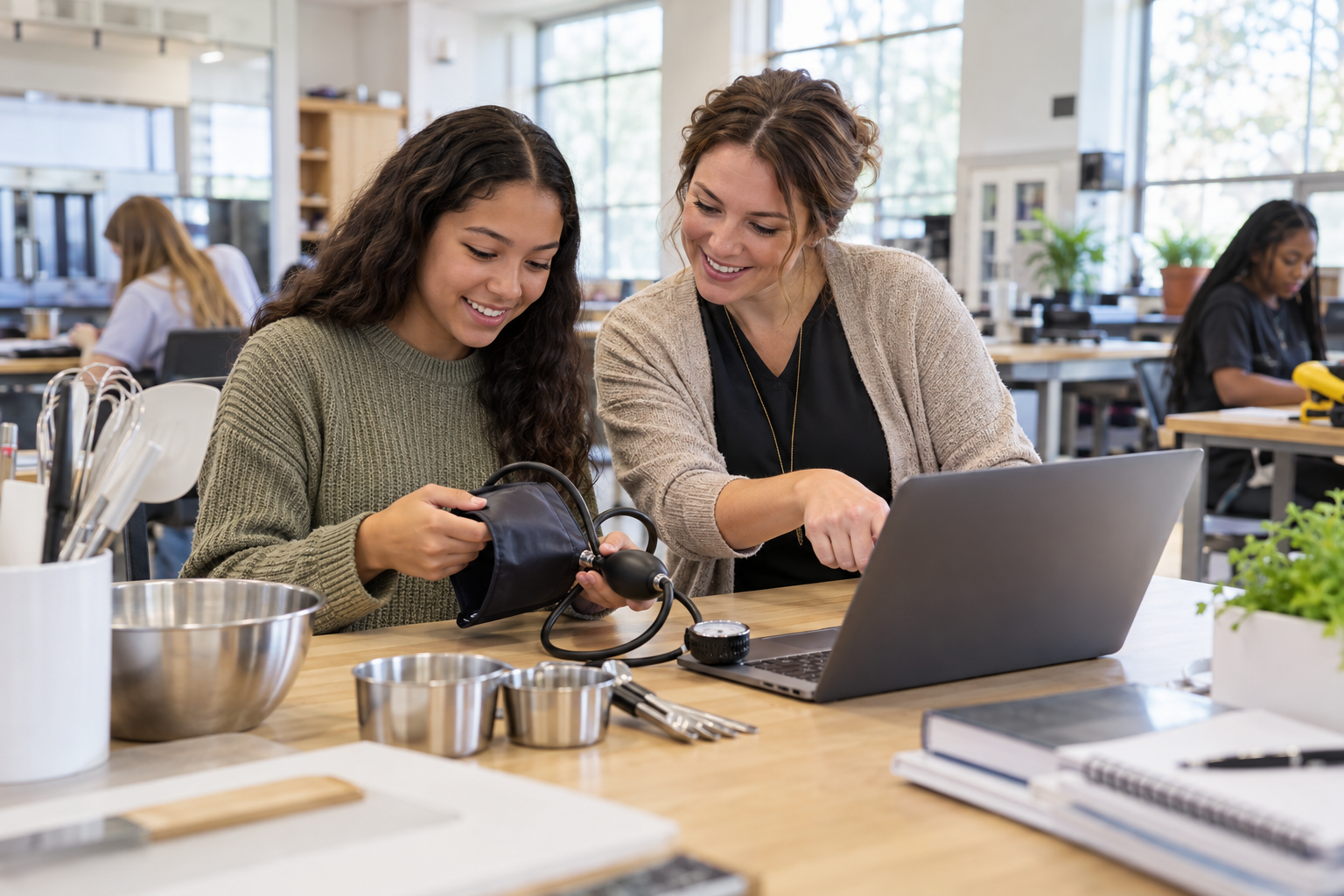 Teen girl exploring career-training opportunities with a mentor